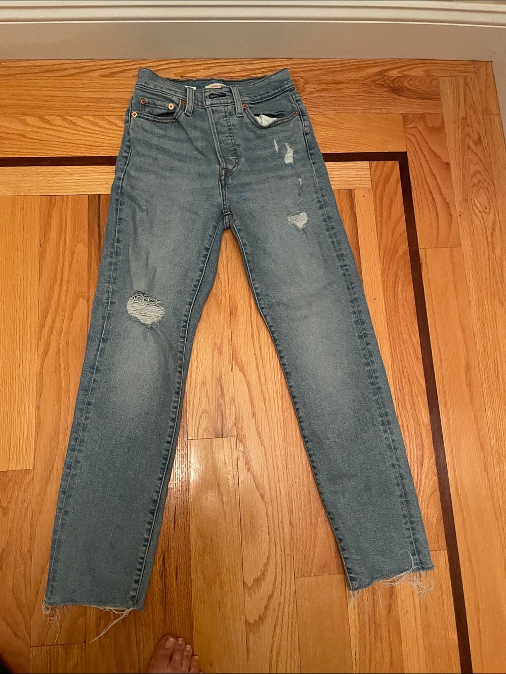 Levi's Women's Skinny Jeans in Light Blue Distressed Wash